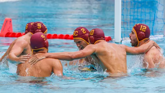 USC starters cheer in the pool before a game at Uytengsu Aquatics Center