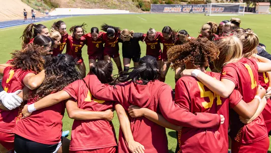 team huddles