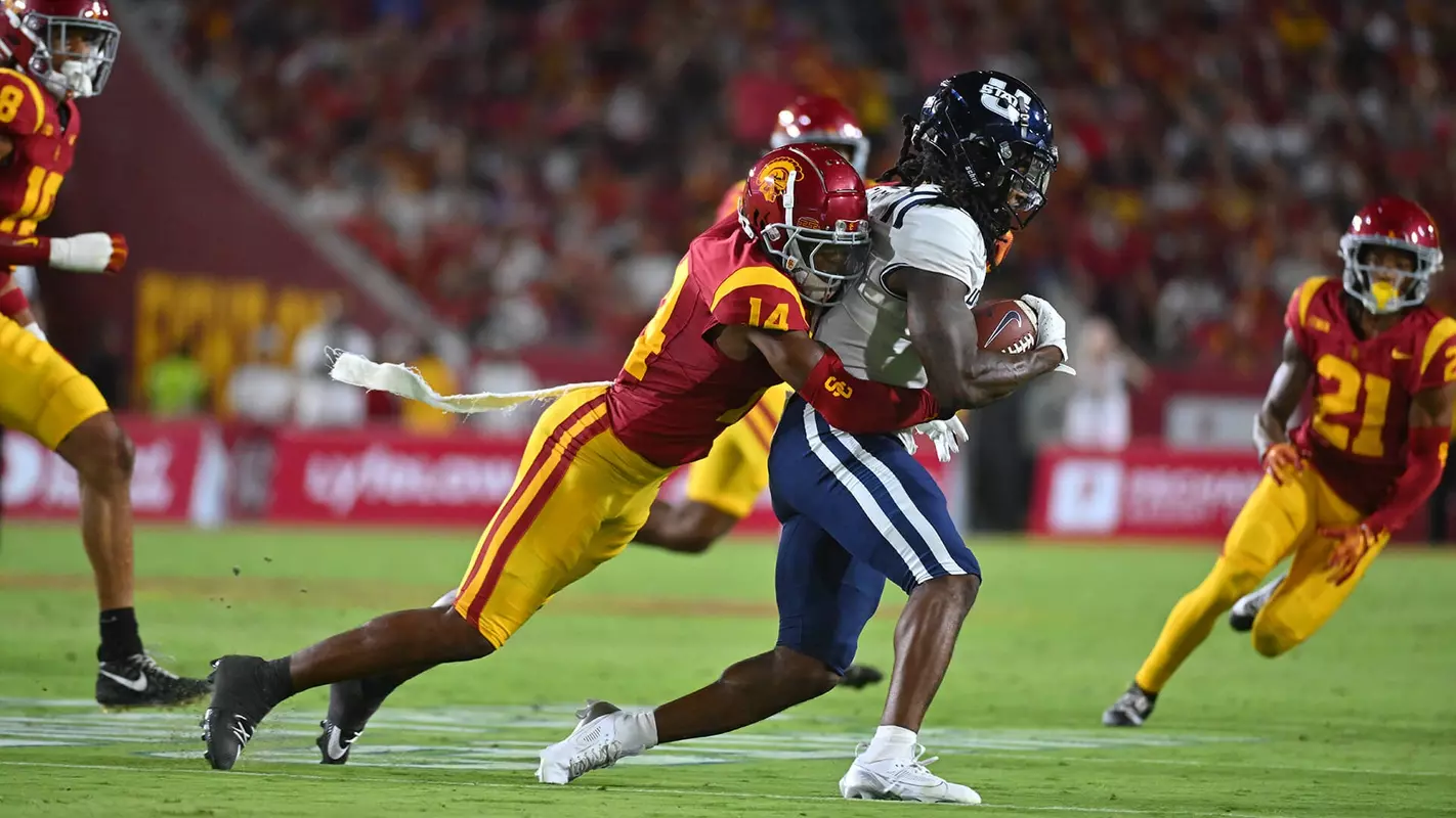 USC Trojans Football cornerback Jacobe Covington tackles Utah State Aggies player