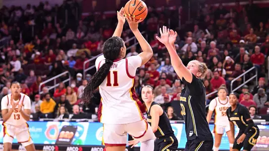 Kennedy Smith pulls up for a jumper in a game at Galen Center