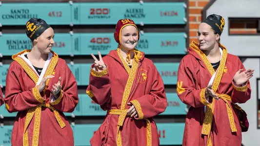 Morgan Netherton gives a fight on when introduced before a game at Uytengsu Aquatics Center.