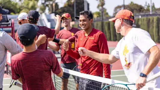 Team Fist Bump at Practice - Men's Tennis