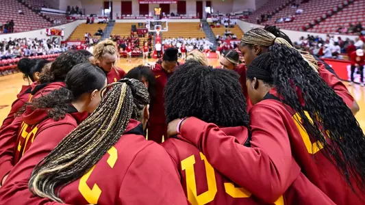 USC players huddle up before a game at Indiana