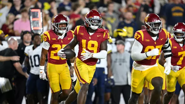 USC Trojans Football safety Bishop Fitzgerald celebrates interception vs. Michigan Wolverines
