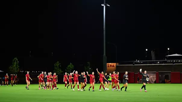 The USC women's soccer team waves to fans after the game against Portland.