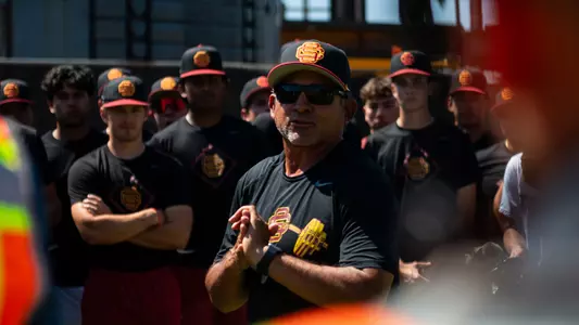 Andy Stankiewicz addresses the team at the beam raising for the new Dedeaux Field.