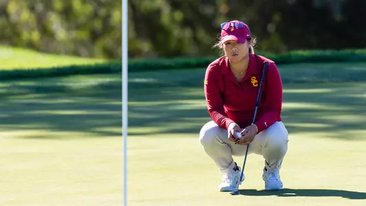 Catherine Park crouching down at the Stanford Intercollegiate