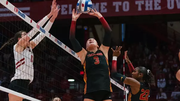 USC women's volleyball setter Reese Messer sets the ball in a match against Wisconsin at UW Field House