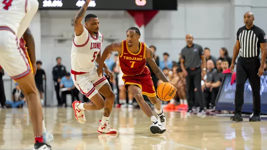 Jordan Marsh dribbling past a Loyola Marymount player