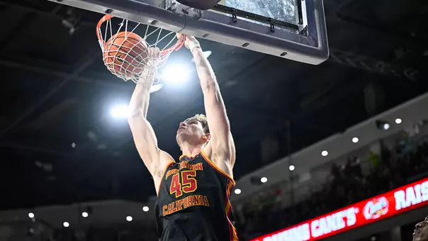 Gabe Dynes dunking on his opponents during an exhibition at Grand Canyon