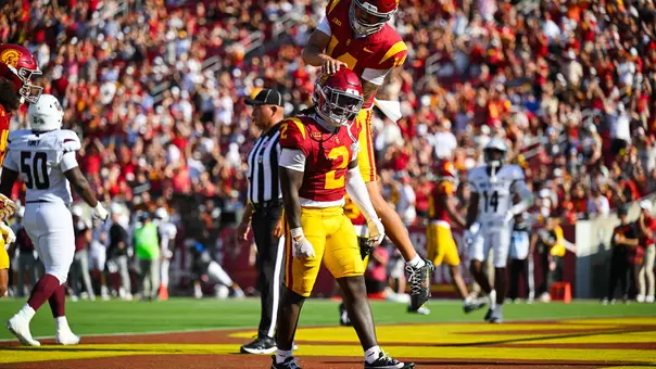 USC Trojans Football running back Waymond Jordan celebrates with Jayden Maiava