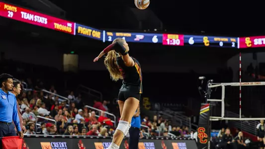 USC women's volleyball libero Taylor Deckert serves the ball during a match at Galen Center