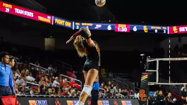 USC women's volleyball libero Taylor Deckert serves the ball during a match at Galen Center