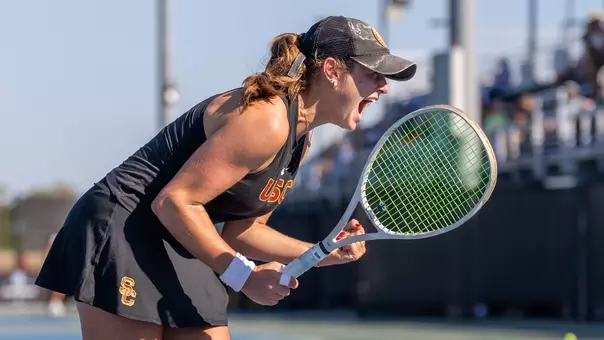 Emma Charney celebrates after an NCAA win