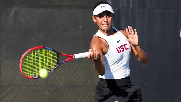 Jana Hossam hits a forehand while competing at the NCAA Championships