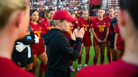 Jane Alukonis addresses her team after a game at Rawlinson Stadium.