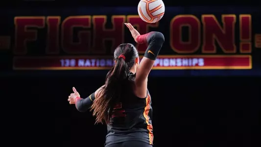 USC women's volleyball outside hitter London Wijay tosses the ball to serve in a match against Nebraska at Galen Center