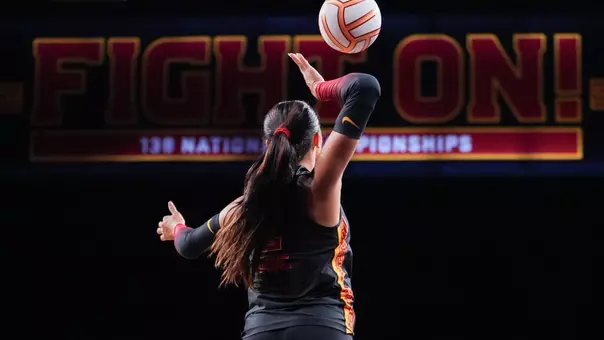 USC women's volleyball outside hitter London Wijay tosses the ball to serve in a match against Nebraska at Galen Center