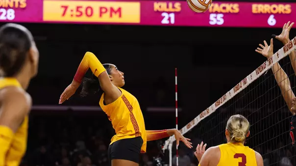 USC women's volleyball middle blocker Leah Ford goes up to attack a ball in a match against Rutgers at Galen Center