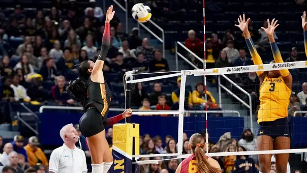 USC women's volleyball outside hitter London Wijay goes up to hit a ball in a match at Michigan's Crisler Center.
