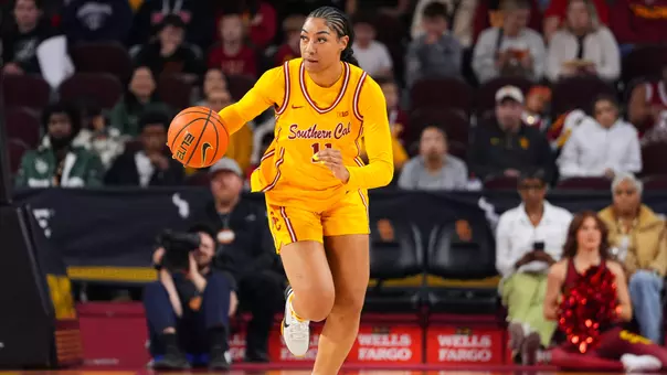 Kennedy Smith dribbles the ball down the court