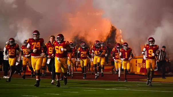 USC Trojans Football team runs out of Coliseum tunnel