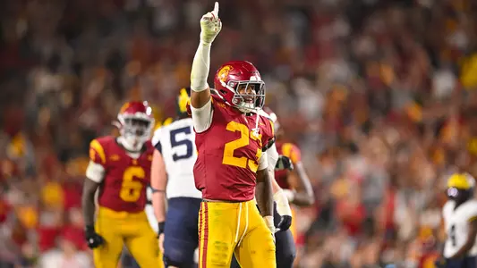 USC Trojans Football linebacker Desman Stephens II celebrates against Michigan Wolverines