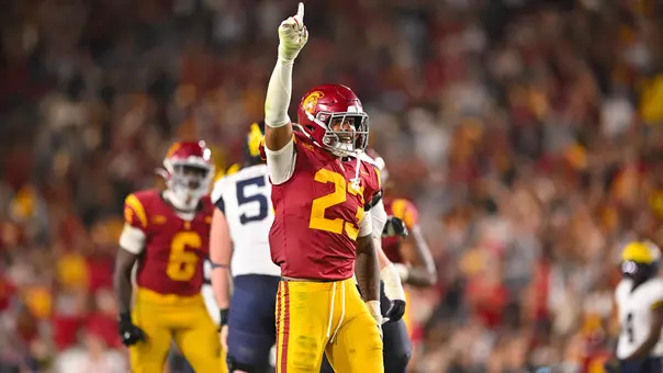 USC Trojans Football linebacker Desman Stephens II celebrates against Michigan Wolverines