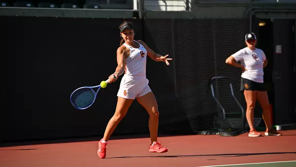 Eugenia Zozaya hits a front-hand return on court