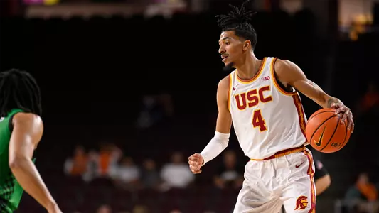 Chad Baker-Mazara preparing to drive to the basket against Manhattan