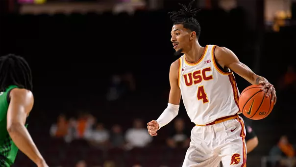 Chad Baker-Mazara preparing to drive to the basket against Manhattan