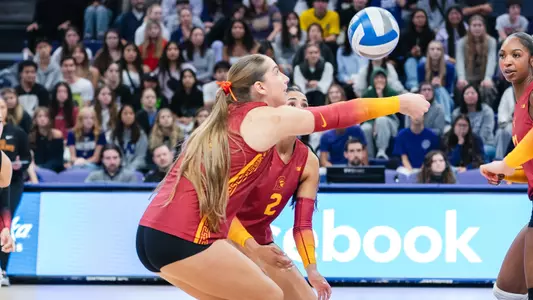 USC women's volleyball opposite hitter Abigail Mullen digs a ball off the block during a match at Alaska Airlines Arena against Washington