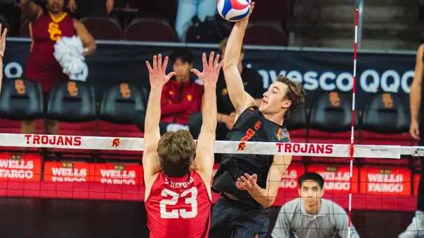 USC men's volleyball outside hitter Dillon Klein hits the ball in a match against Stanford at Galen Center.