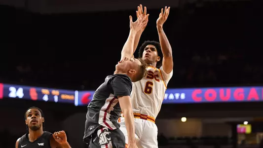 Jacob Cofie puts up a shot against Washington State