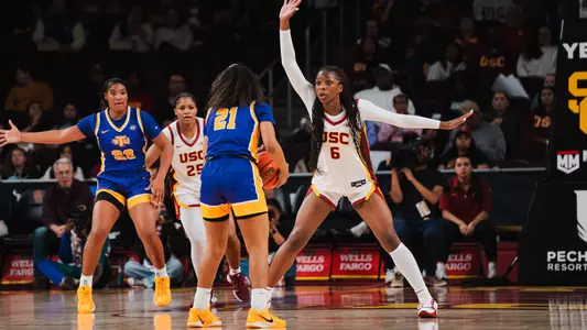 Laura Williams puts her hand up to defend against an opponent on court