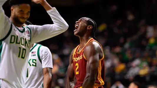 Ezra Ausar celebrating after making a basket against Oregon