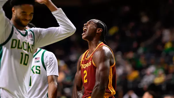 Ezra Ausar celebrating after making a basket against Oregon