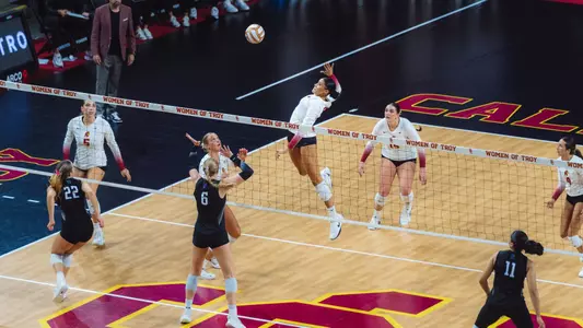 USC women's volleyball middle blocker Mia Tvrdy goes up to hit a ball in a match at Galen Center