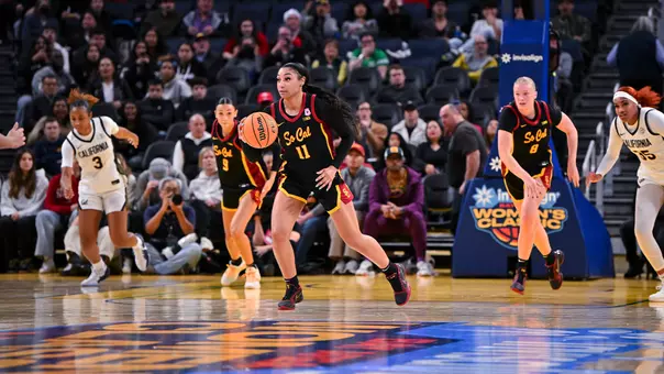 Kennedy Smith brings the ball down the court.