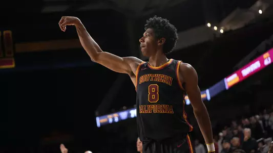 Jerry Easter II shoots a three against Washington