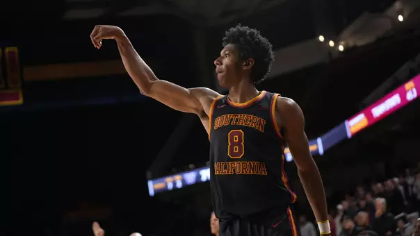 Jerry Easter II shoots a three against Washington