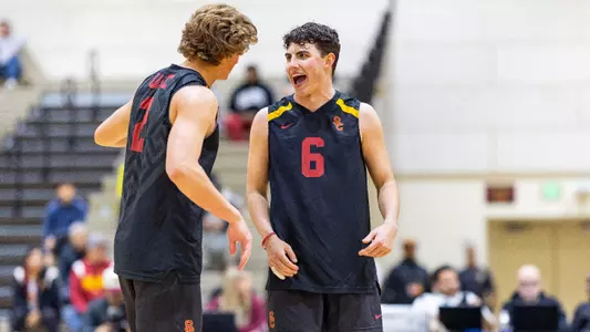 USC mens volleyball sophomore setter Caleb Blanchette celebrates a point with opposite hitter Noah Roberts during a match against Daemen at Galen Center Pavilion.