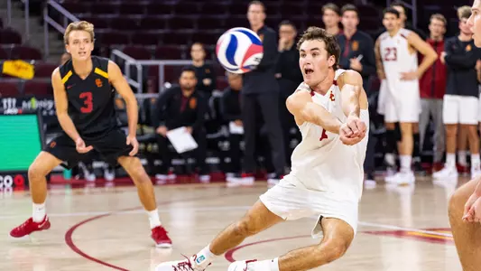 USC men's volleyball junior outside hitter Dillon Klein dives to pass a ball during a match against 19th-ranked Princeton at Galen Center.