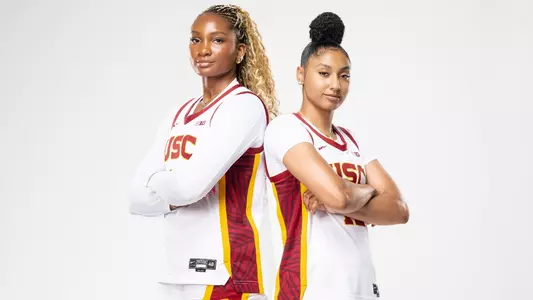 Kiki Iriafen and JuJu Watkins pose together during a USC photo shoot.