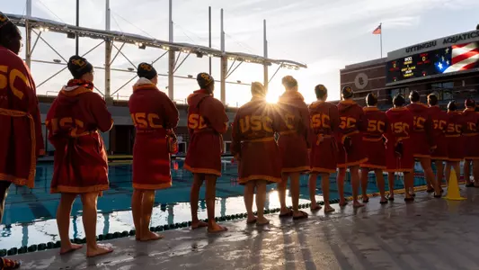 USC players line up for the national anthem before a game at Uytengsu Aquatics Center.