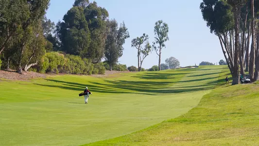 Senior Xin (Cindy) Kou walks up the hill at the Palos Verdes Golf Club