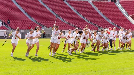 The USC Lacrosse Team Runs out on the Field vs. Stanford