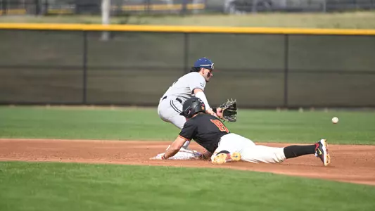 Kade Higgins slides into second after hitting a double against George Washington.