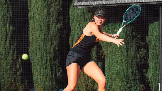 Lily Fairclough playing tennis