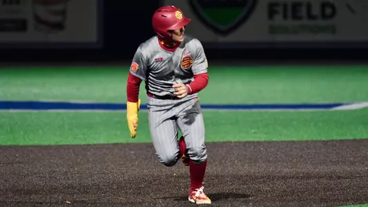 Kevin Takeuchi runs to third in a 7-4 win for the USC Baseball Team at Rice.
